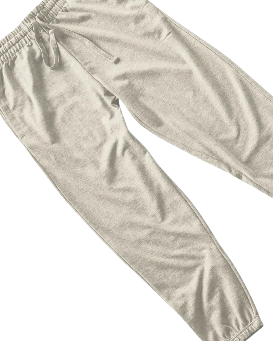Cream POUND straight-leg joggers flat lay on white background